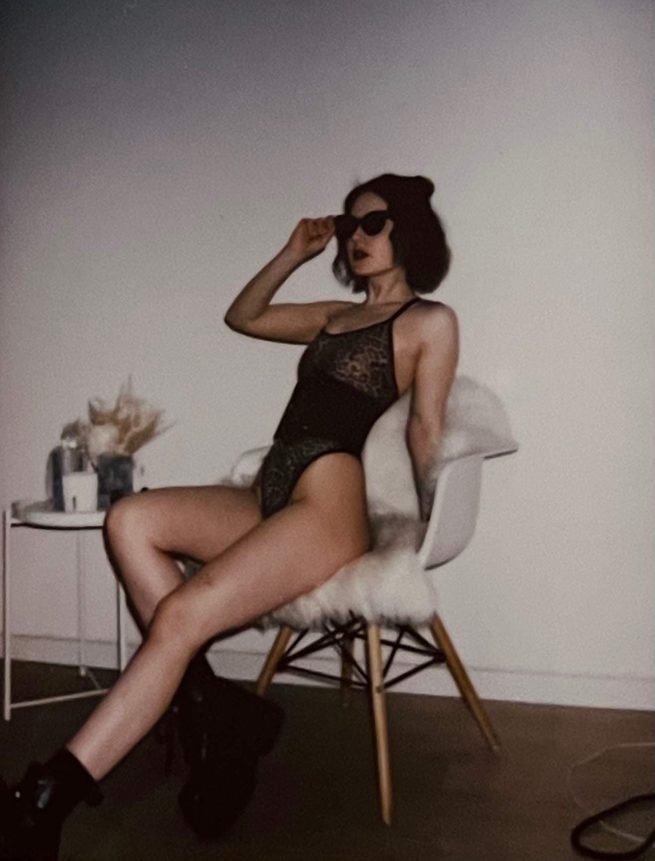 J.