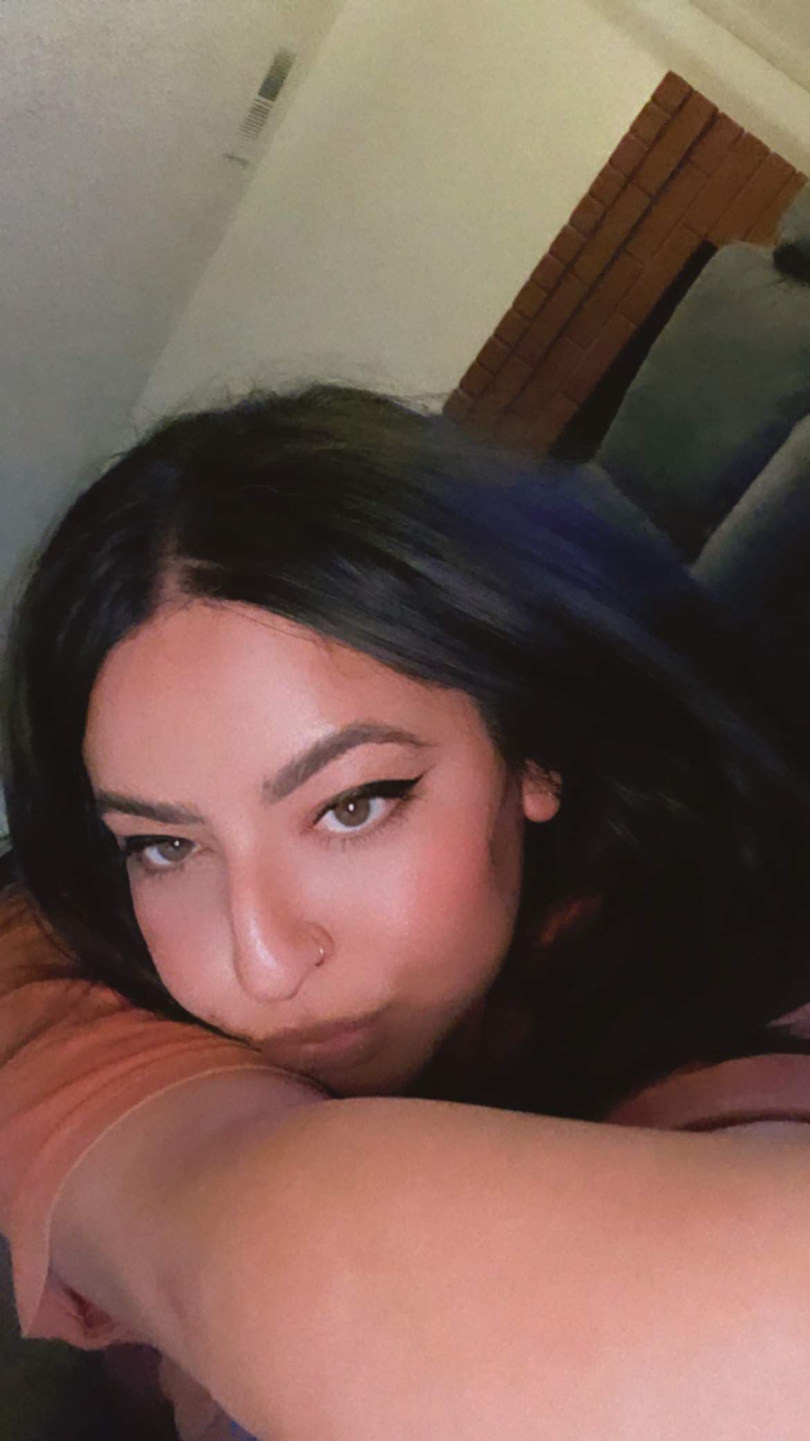 L.